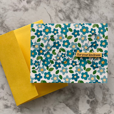 handmade card featuring aqua floral patterned paper