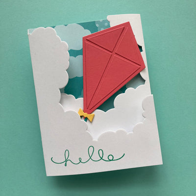 handmade card featuring echo park kite flying paper 