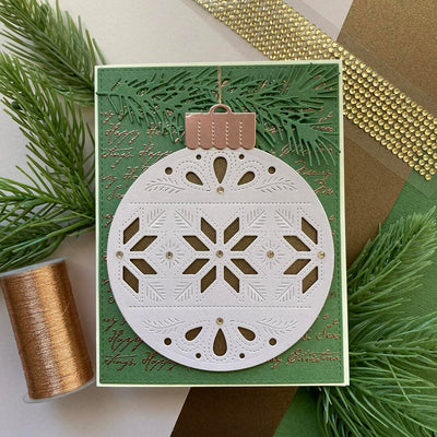 Handmade card featuring a large ornament die cut and Nixon cardstock from Bazzill.