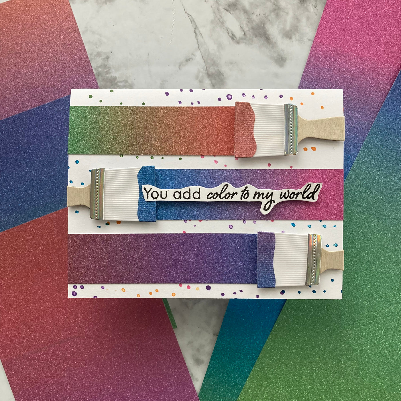 handmade card featuring multi-color glitter