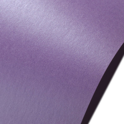 A sheet of royal purple cardstock with a faint pearlescent sheen.
