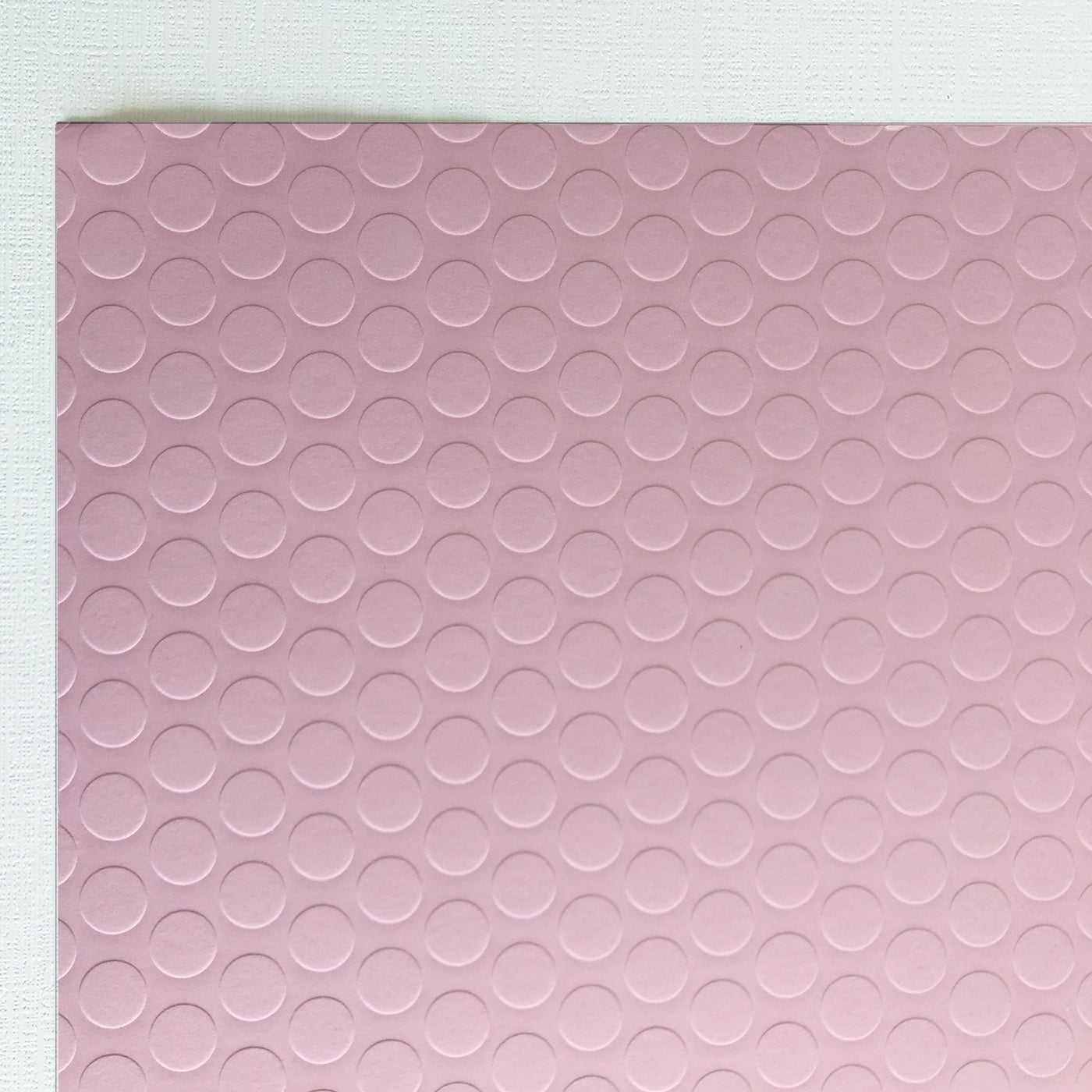 Pink cardstock with large Embossed dot pattern