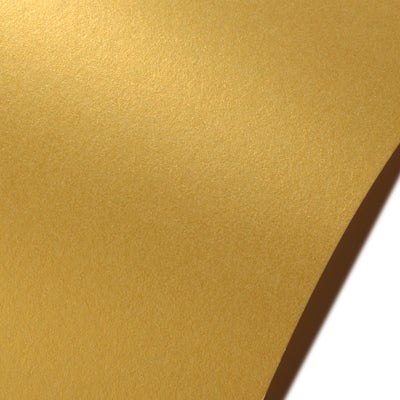 Gold Neenah Stardream. Gold cardstock with a faint pearlescent sheen.